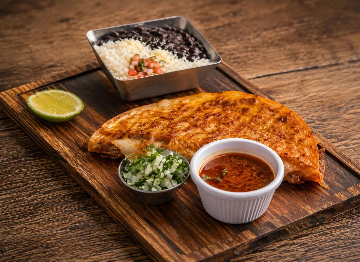 Popular item de Latin on Ocean Drive: QUESABIRRIA